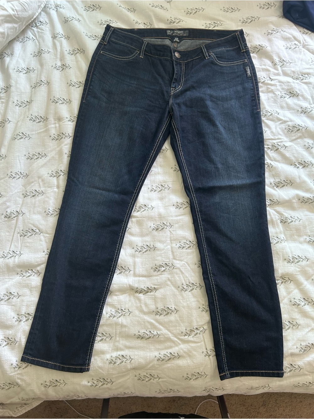 Silver Jeans dark indigo with tan stitching skinny leg